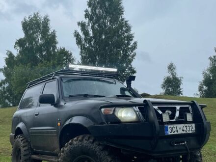 Чорний Ніссан Патрол, об'ємом двигуна 3 л та пробігом 3 тис. км за 7000 $, фото 1 на Automoto.ua
