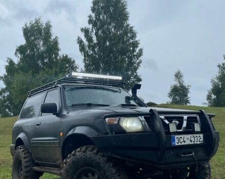 Чорний Ніссан Патрол, об'ємом двигуна 3 л та пробігом 3 тис. км за 7000 $, фото 1 на Automoto.ua