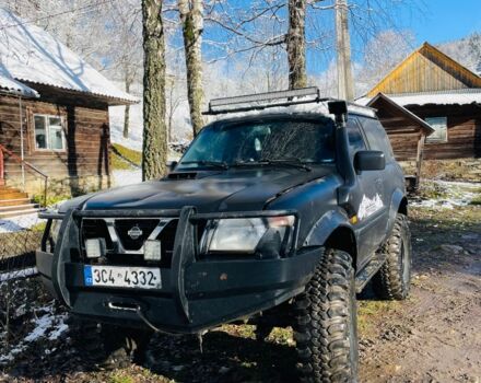 Черный Ниссан Патрол, объемом двигателя 3 л и пробегом 300 тыс. км за 6100 $, фото 1 на Automoto.ua