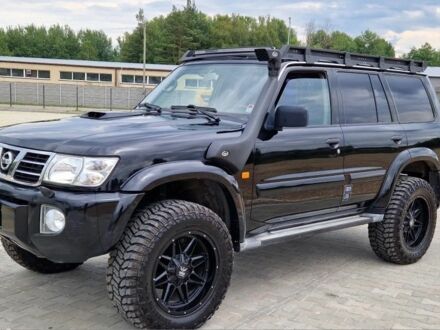 Чорний Ніссан Патрол, об'ємом двигуна 3 л та пробігом 290 тис. км за 3750 $, фото 1 на Automoto.ua