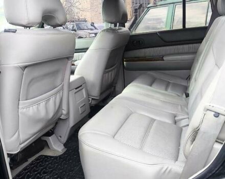 Черный Ниссан Патрол, объемом двигателя 4.8 л и пробегом 396 тыс. км за 37000 $, фото 1 на Automoto.ua