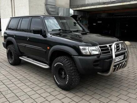 Черный Ниссан Патрол, объемом двигателя 3 л и пробегом 276 тыс. км за 22500 $, фото 1 на Automoto.ua