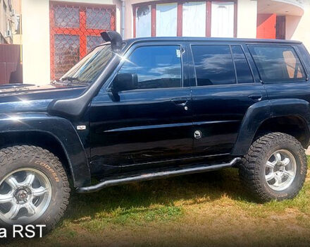 Черный Ниссан Патрол, объемом двигателя 3 л и пробегом 232 тыс. км за 12700 $, фото 1 на Automoto.ua