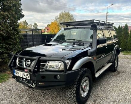 Черный Ниссан Патрол, объемом двигателя 3 л и пробегом 255 тыс. км за 2999 $, фото 1 на Automoto.ua