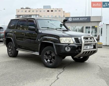 Черный Ниссан Патрол, объемом двигателя 3 л и пробегом 359 тыс. км за 18999 $, фото 1 на Automoto.ua