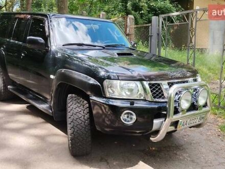 Чорний Ніссан Патрол, об'ємом двигуна 3 л та пробігом 230 тис. км за 23500 $, фото 1 на Automoto.ua