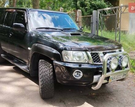 Чорний Ніссан Патрол, об'ємом двигуна 3 л та пробігом 230 тис. км за 23500 $, фото 1 на Automoto.ua