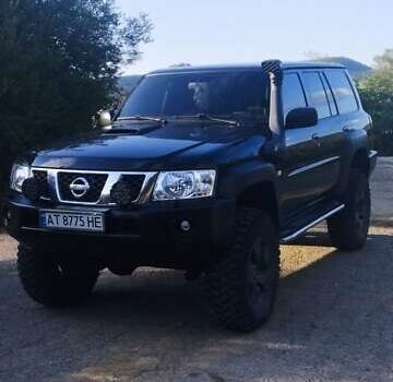 Чорний Ніссан Патрол, об'ємом двигуна 3 л та пробігом 320 тис. км за 17500 $, фото 1 на Automoto.ua
