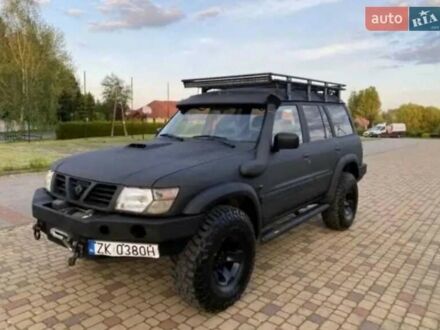 Черный Ниссан Патрол, объемом двигателя 3 л и пробегом 233 тыс. км за 3500 $, фото 1 на Automoto.ua