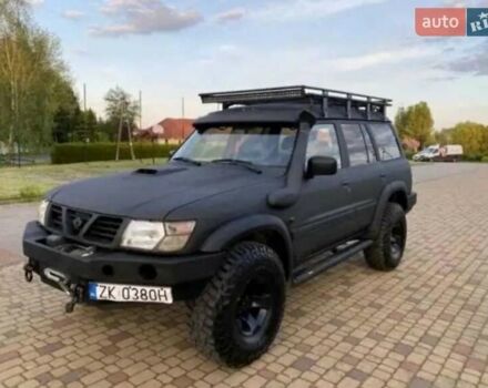 Черный Ниссан Патрол, объемом двигателя 3 л и пробегом 233 тыс. км за 3500 $, фото 1 на Automoto.ua