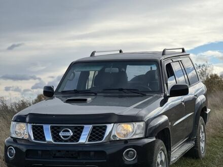 Черный Ниссан Патрол, объемом двигателя 3 л и пробегом 193 тыс. км за 10000 $, фото 1 на Automoto.ua