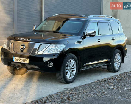 Черный Ниссан Патрол, объемом двигателя 5.55 л и пробегом 170 тыс. км за 21500 $, фото 1 на Automoto.ua