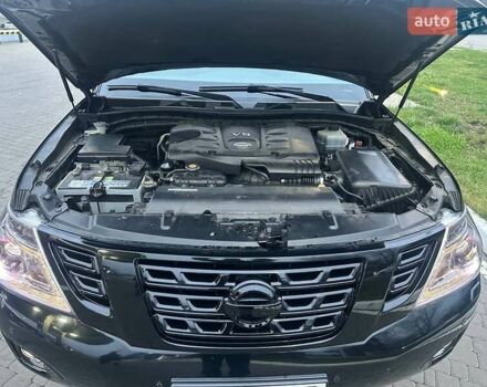 Черный Ниссан Патрол, объемом двигателя 5.55 л и пробегом 177 тыс. км за 25000 $, фото 1 на Automoto.ua