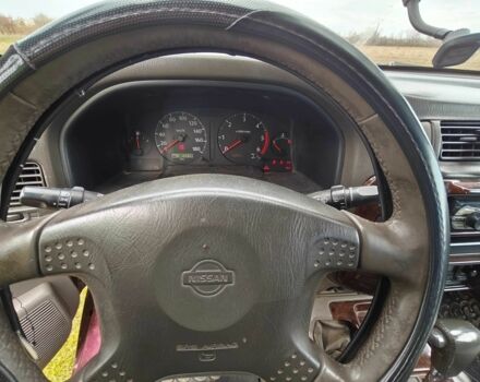 Красный Ниссан Патрол, объемом двигателя 3 л и пробегом 327 тыс. км за 11000 $, фото 8 на Automoto.ua