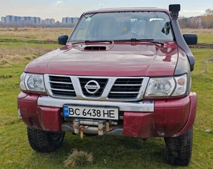 Красный Ниссан Патрол, объемом двигателя 3 л и пробегом 327 тыс. км за 11000 $, фото 2 на Automoto.ua
