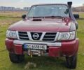 Красный Ниссан Патрол, объемом двигателя 3 л и пробегом 327 тыс. км за 11000 $, фото 2 на Automoto.ua
