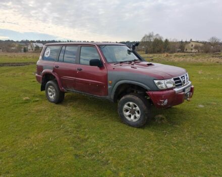 Красный Ниссан Патрол, объемом двигателя 3 л и пробегом 327 тыс. км за 11000 $, фото 3 на Automoto.ua