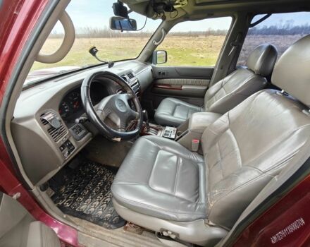 Красный Ниссан Патрол, объемом двигателя 3 л и пробегом 327 тыс. км за 11000 $, фото 7 на Automoto.ua