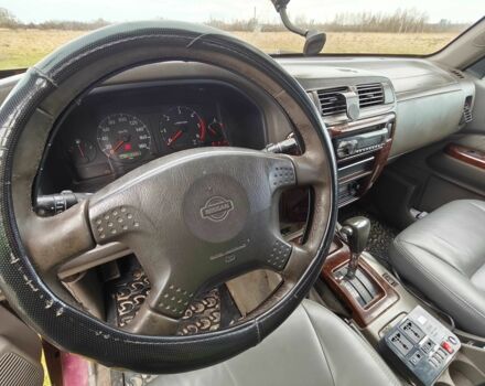 Красный Ниссан Патрол, объемом двигателя 3 л и пробегом 327 тыс. км за 11000 $, фото 9 на Automoto.ua