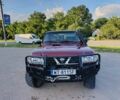Красный Ниссан Патрол, объемом двигателя 0 л и пробегом 220 тыс. км за 8800 $, фото 1 на Automoto.ua