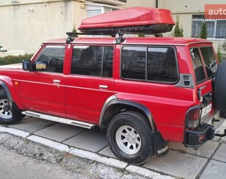 Красный Ниссан Патрол, объемом двигателя 2.8 л и пробегом 413 тыс. км за 12890 $, фото 3 на Automoto.ua