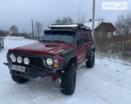 Червоний Ніссан Патрол, об'ємом двигуна 4.2 л та пробігом 300 тис. км за 14700 $, фото 9 на Automoto.ua