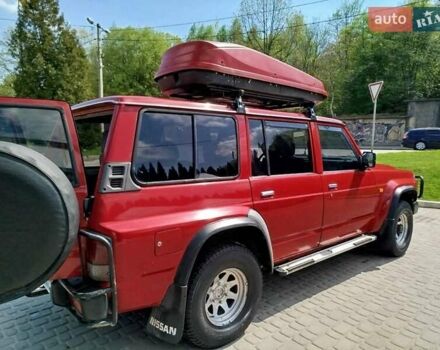 Красный Ниссан Патрол, объемом двигателя 2.8 л и пробегом 413 тыс. км за 17000 $, фото 8 на Automoto.ua
