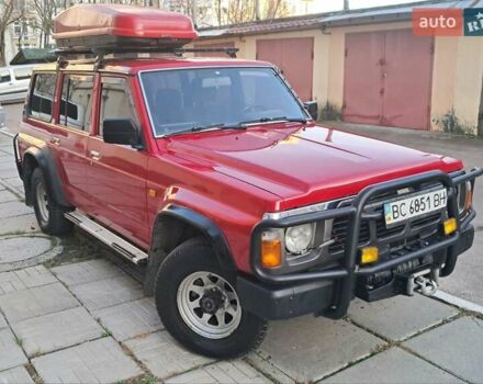 Красный Ниссан Патрол, объемом двигателя 2.8 л и пробегом 413 тыс. км за 12890 $, фото 11 на Automoto.ua