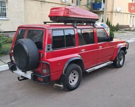 Красный Ниссан Патрол, объемом двигателя 2.8 л и пробегом 413 тыс. км за 12890 $, фото 26 на Automoto.ua