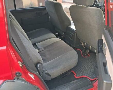 Красный Ниссан Патрол, объемом двигателя 2.8 л и пробегом 413 тыс. км за 12890 $, фото 15 на Automoto.ua