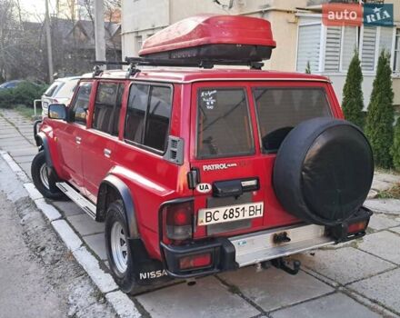 Красный Ниссан Патрол, объемом двигателя 2.8 л и пробегом 413 тыс. км за 12890 $, фото 4 на Automoto.ua