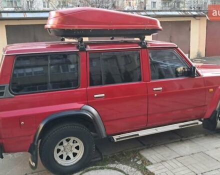 Красный Ниссан Патрол, объемом двигателя 2.8 л и пробегом 413 тыс. км за 12890 $, фото 8 на Automoto.ua