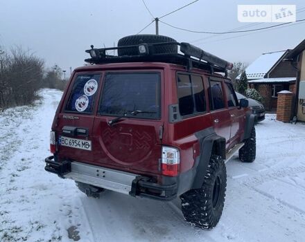 Красный Ниссан Патрол, объемом двигателя 4.2 л и пробегом 300 тыс. км за 14700 $, фото 6 на Automoto.ua