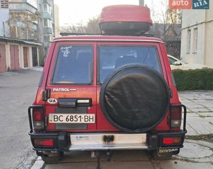 Красный Ниссан Патрол, объемом двигателя 2.8 л и пробегом 413 тыс. км за 12890 $, фото 5 на Automoto.ua