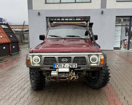 Красный Ниссан Патрол, объемом двигателя 2.8 л и пробегом 250 тыс. км за 7500 $, фото 3 на Automoto.ua