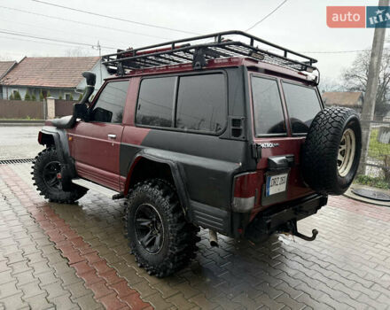 Красный Ниссан Патрол, объемом двигателя 2.8 л и пробегом 250 тыс. км за 7500 $, фото 5 на Automoto.ua