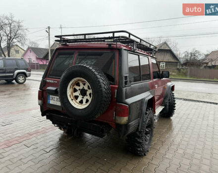 Красный Ниссан Патрол, объемом двигателя 2.8 л и пробегом 250 тыс. км за 7500 $, фото 4 на Automoto.ua