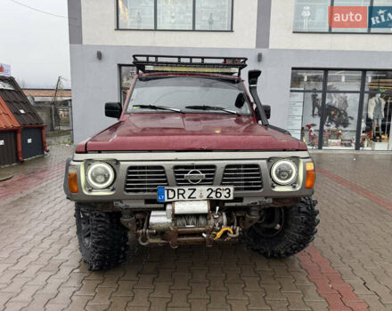 Красный Ниссан Патрол, объемом двигателя 2.8 л и пробегом 250 тыс. км за 7500 $, фото 1 на Automoto.ua