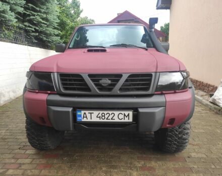 Красный Ниссан Патрол, объемом двигателя 3 л и пробегом 250 тыс. км за 35000 $, фото 1 на Automoto.ua