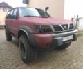 Красный Ниссан Патрол, объемом двигателя 3 л и пробегом 250 тыс. км за 35000 $, фото 2 на Automoto.ua