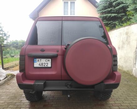 Красный Ниссан Патрол, объемом двигателя 3 л и пробегом 250 тыс. км за 35000 $, фото 5 на Automoto.ua