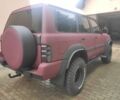 Красный Ниссан Патрол, объемом двигателя 3 л и пробегом 250 тыс. км за 35000 $, фото 4 на Automoto.ua