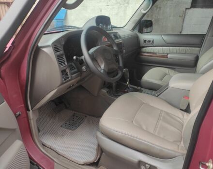 Красный Ниссан Патрол, объемом двигателя 3 л и пробегом 250 тыс. км за 35000 $, фото 7 на Automoto.ua