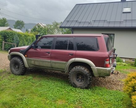 Червоний Ніссан Патрол, об'ємом двигуна 0 л та пробігом 290 тис. км за 9300 $, фото 4 на Automoto.ua