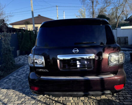 Красный Ниссан Патрол, объемом двигателя 5.55 л и пробегом 180 тыс. км за 20000 $, фото 5 на Automoto.ua