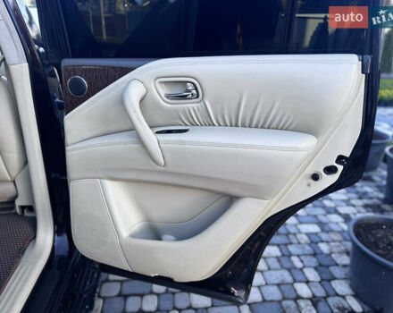 Красный Ниссан Патрол, объемом двигателя 5.55 л и пробегом 180 тыс. км за 20000 $, фото 13 на Automoto.ua