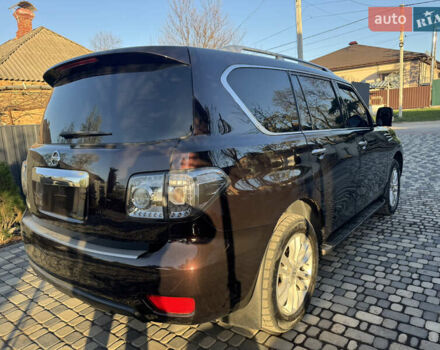 Красный Ниссан Патрол, объемом двигателя 5.55 л и пробегом 180 тыс. км за 20000 $, фото 7 на Automoto.ua