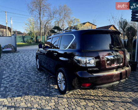 Красный Ниссан Патрол, объемом двигателя 5.55 л и пробегом 180 тыс. км за 20000 $, фото 4 на Automoto.ua