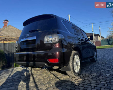 Красный Ниссан Патрол, объемом двигателя 5.55 л и пробегом 180 тыс. км за 20000 $, фото 16 на Automoto.ua