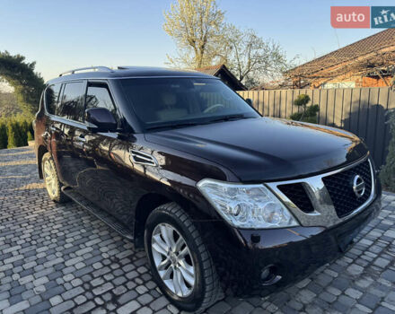 Красный Ниссан Патрол, объемом двигателя 5.55 л и пробегом 180 тыс. км за 20000 $, фото 2 на Automoto.ua